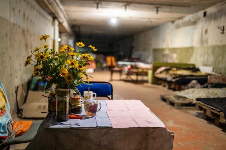Sleeping in underground shelters like this one outside Kharkiv is still a daily reality for Ukrainians living in the eastern part of the country. Here, WCK teams bring 300 meal kits a week for families to cook with. Sunflowers provide a sense of warmth. 🌻 #ChefsForUkraine