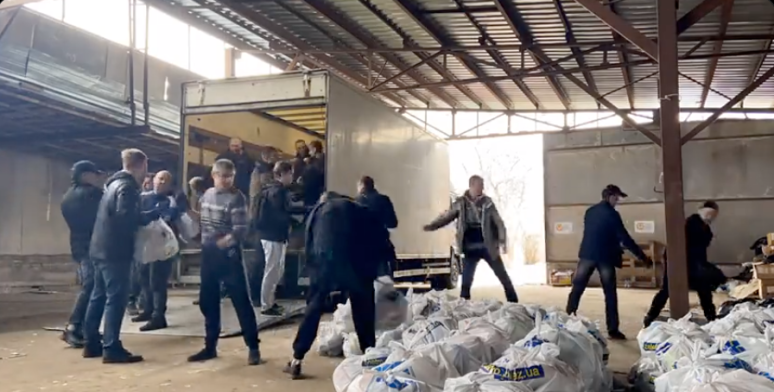 The @WCKitchen team in action in Kyiv! They are at our warehouse filling up a truck to be sent to Hostomel—which was occupied by Russian troops until recently…Each bag contains nearly 20 pounds of food for families who have been living in basements for weeks. #ChefsForUkraine 🇺🇦