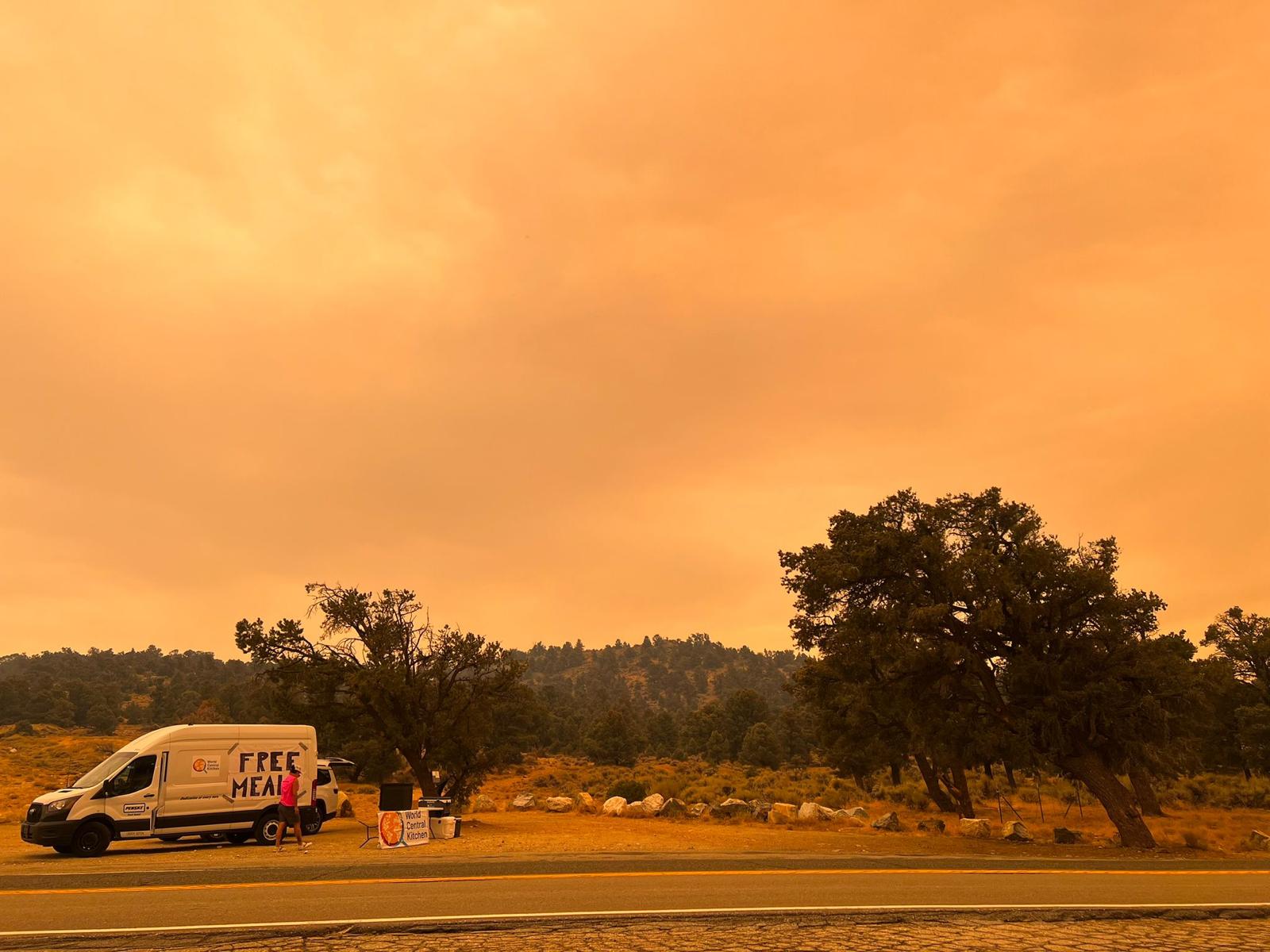 A WCK team distributes meals from a van during a wildfire.
From rapid response mobile kitchens to local farmers' markets and Chef Corps partnerships, World Central Kitchen is innovating wildfire relief across 50+ responses worldwide. Learn how WCK shows up.