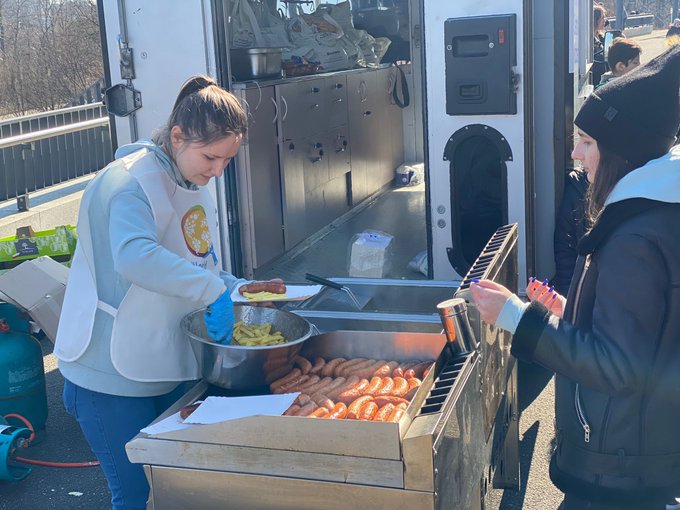 After families cross the border into Poland, most continue on to larger cities like Warsaw. The National Stadium is set up to register 1,600 people each day, but 7,000+ arrived yesterday. As they expand capacity, WCK is here with fresh meals for families waiting. #ChefsForUkraine