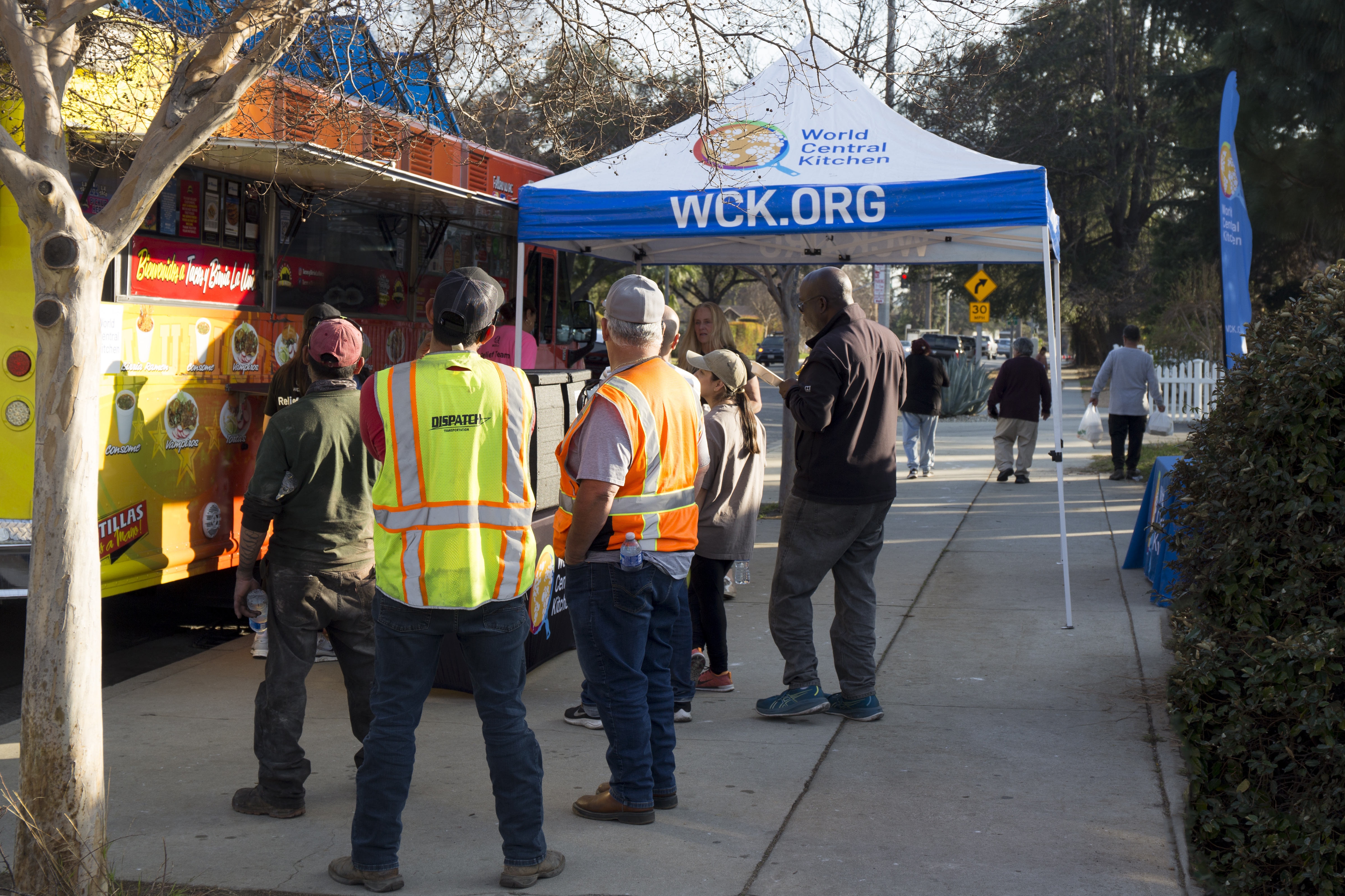 People lined up at a WCK meal distribution site in Atadena after the 2024 LA wildfires.
