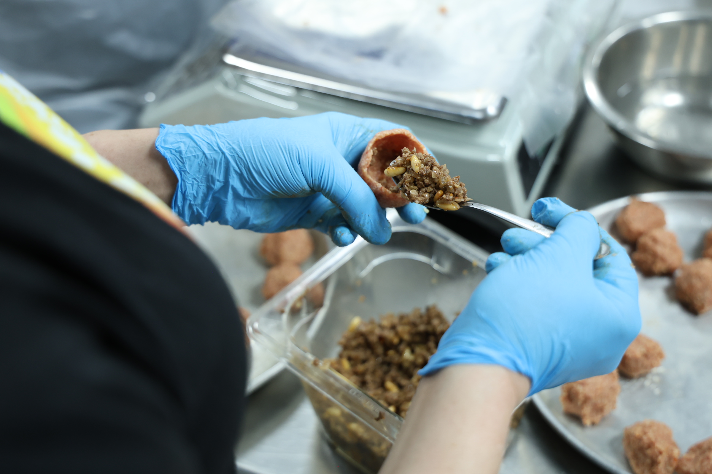 Shaping traditional Lebanese Kibbeh Labanieh served by WCK.